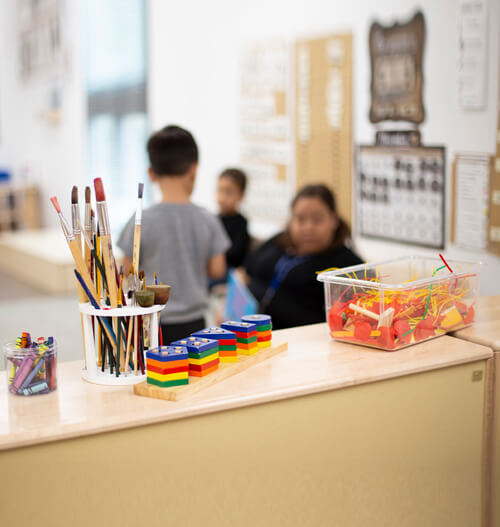 A child paints a portrait in the DV child Center