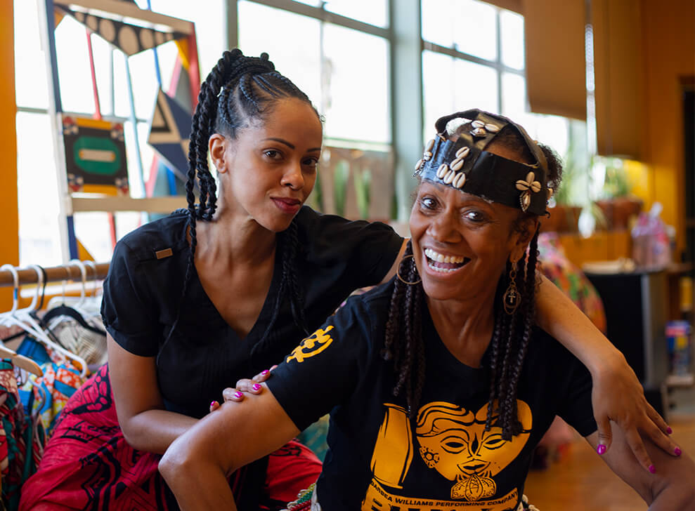 Barbea Williams and her daughter, Bea, posing for a photo