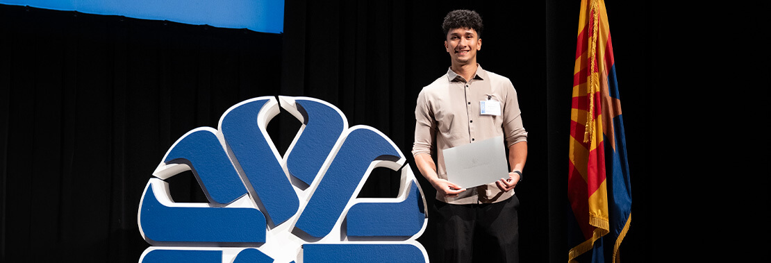 Zamir with his Pima Hero award.