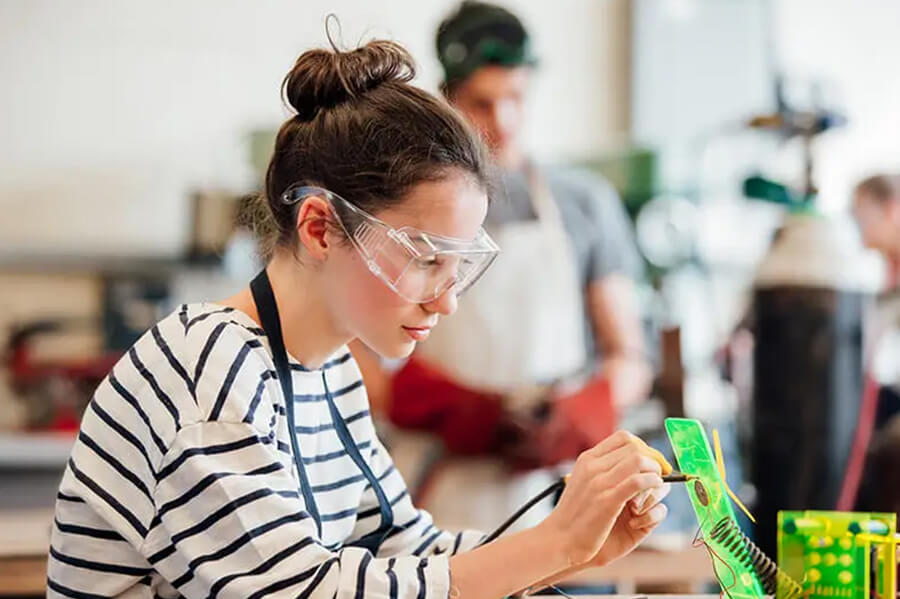 A student works on a project in a science classroom