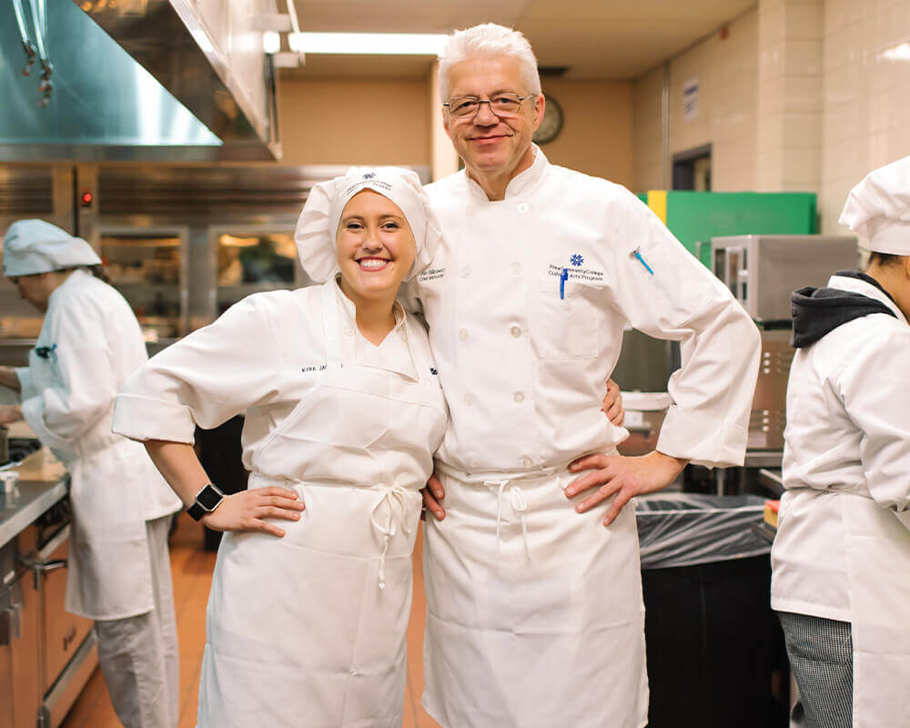 Student in the culinary center kitchen.