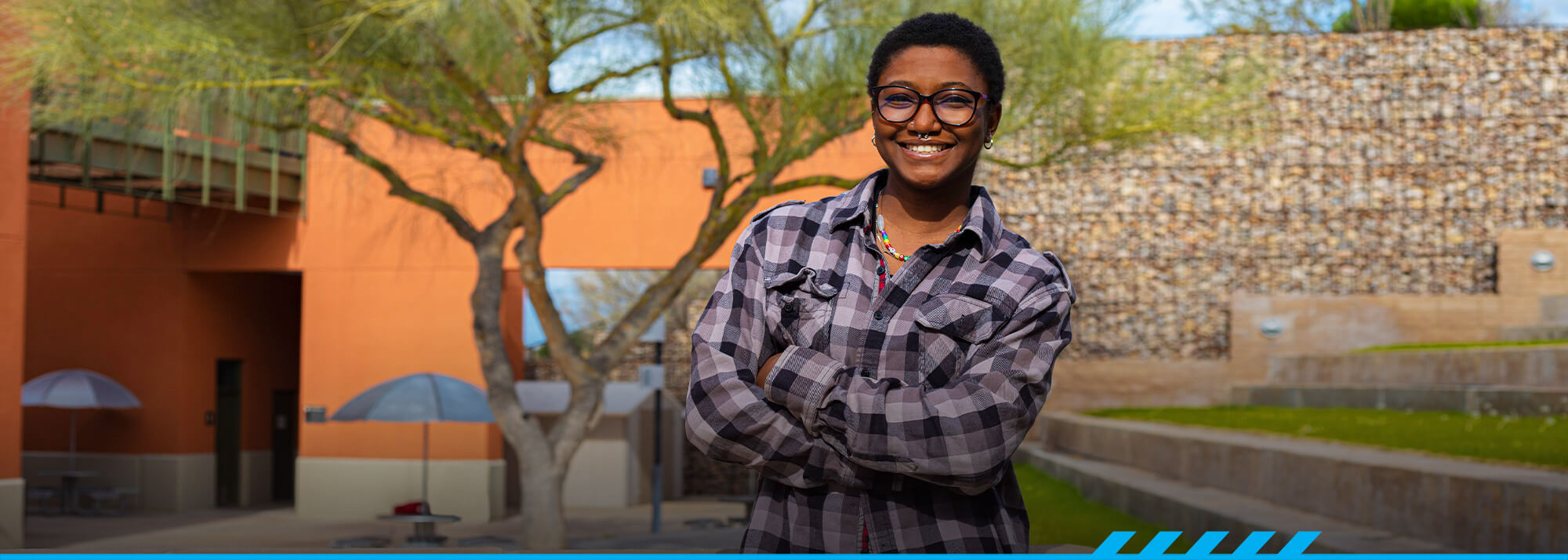 Fortune Dominic poses for the camera at Pima's Northwest campus.