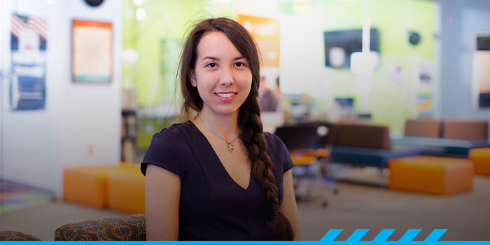 Kira Okuma poses looking at the camera at Pima's Northwest campus.