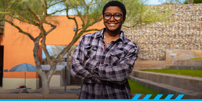 Fortune Dominic poses for the camera at Pima's Northwest campus.