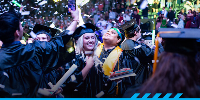 Graduates celebrate at the TCC arena in Tucson.