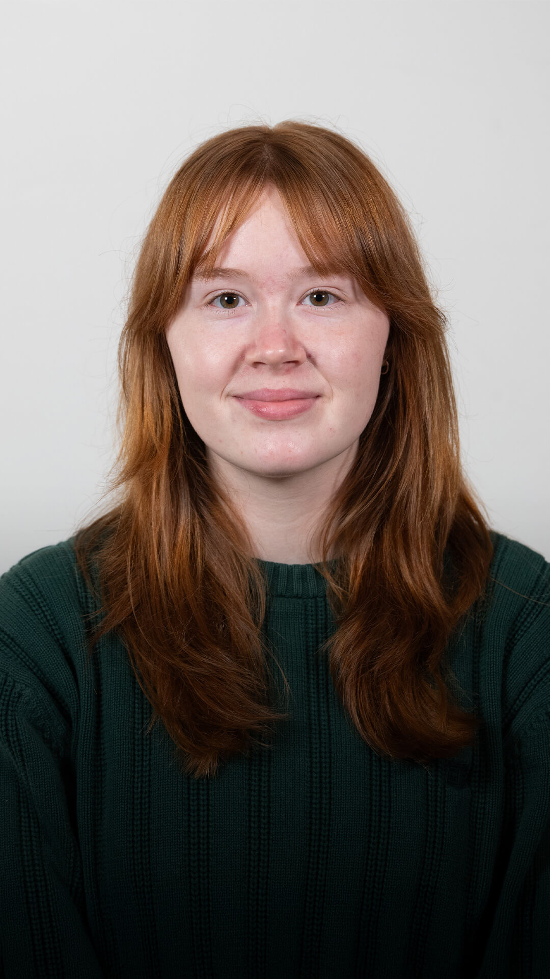 Hannah poses for a portrait.