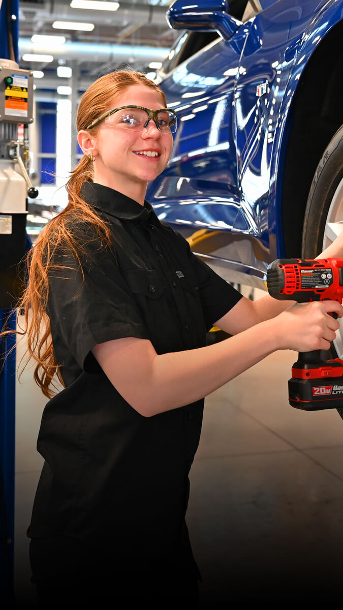 Jessa in the automotive technology center at downtown campus.