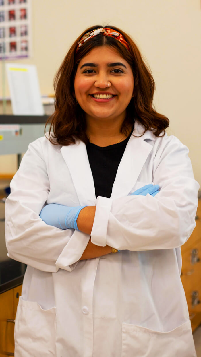 Marian Jimenez Stands Smiling