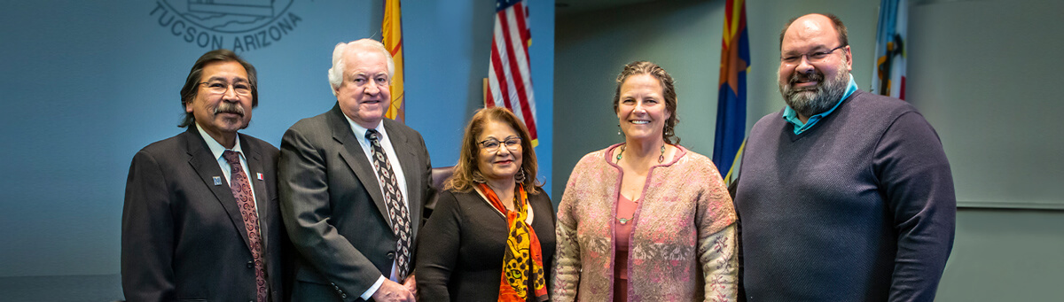 Pima's five Governing Board Members pose for a photo