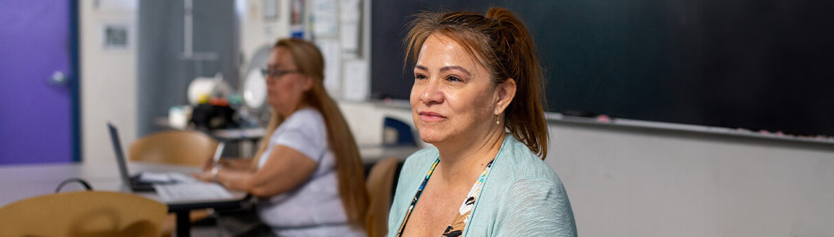 An adult learner studies at a Pima Adult Learning Center