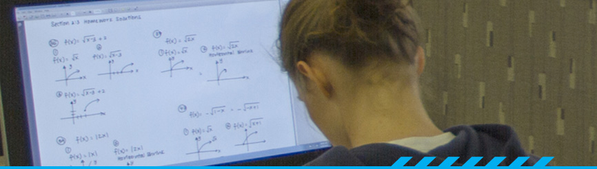 Student working on math problems on a computer